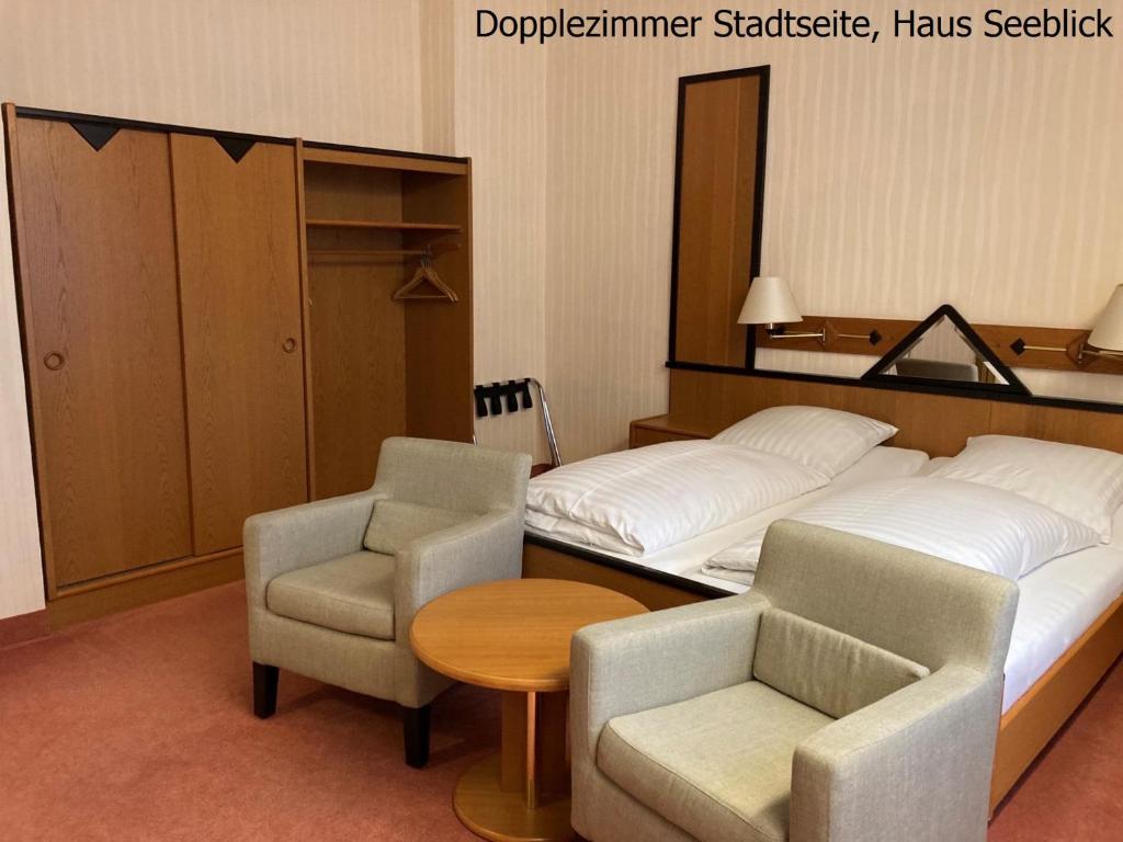 Postel nebo postele na pokoji v ubytování Haus Seeblick