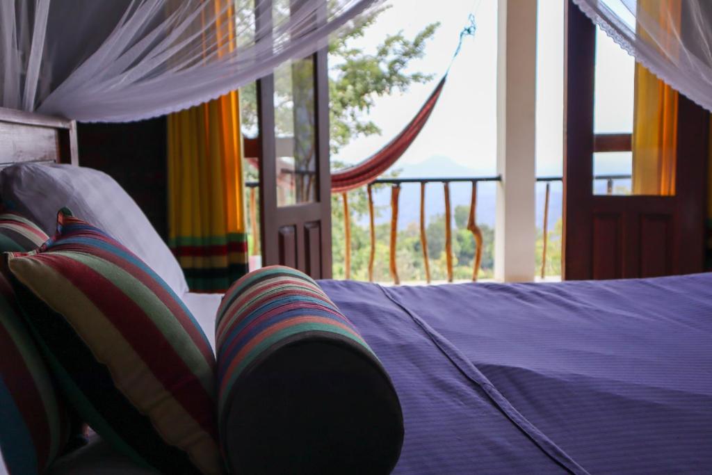 Postel nebo postele na pokoji v ubytování Shambala Retreat