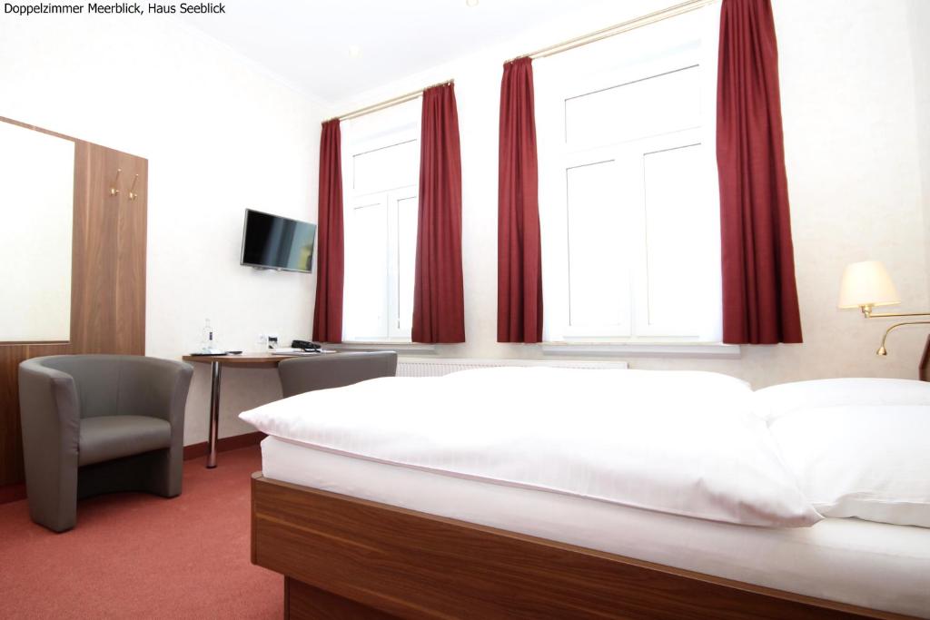 Postel nebo postele na pokoji v ubytování Haus Seeblick