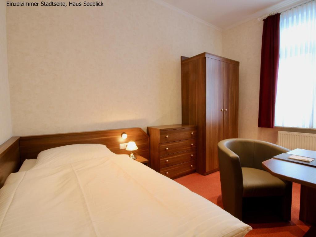 Postel nebo postele na pokoji v ubytování Haus Seeblick
