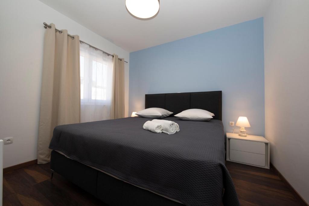 Posteľ alebo postele v izbe v ubytovaní Villa View Jasna