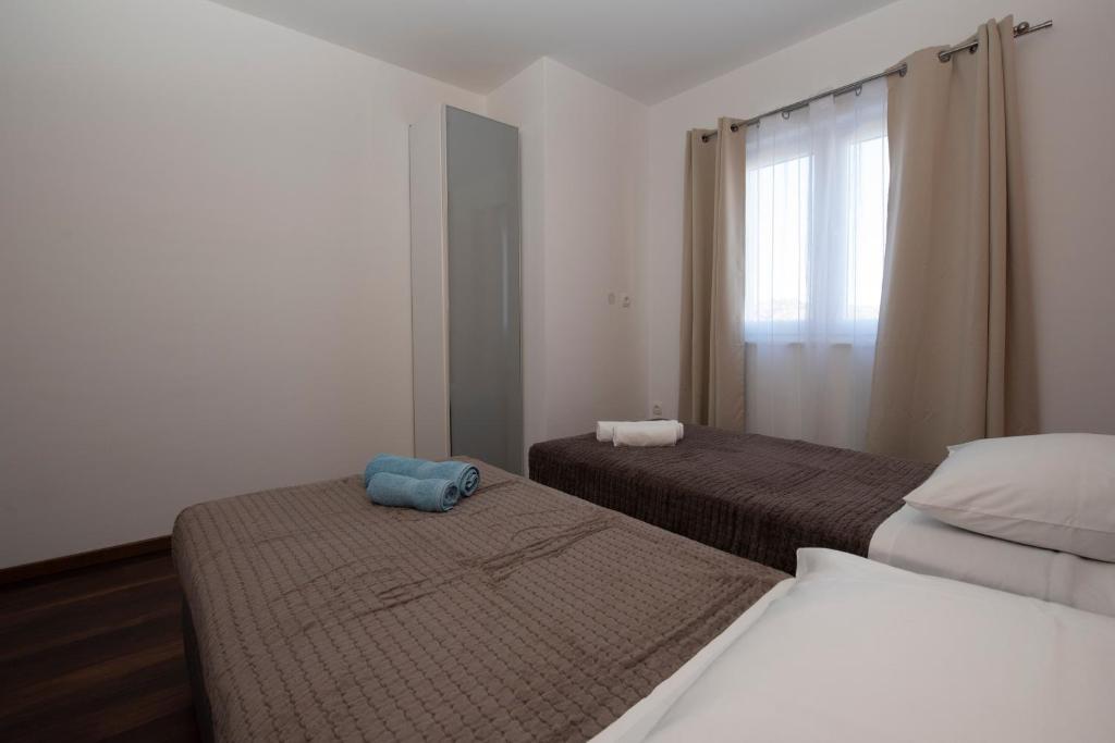 Posteľ alebo postele v izbe v ubytovaní Villa View Jasna