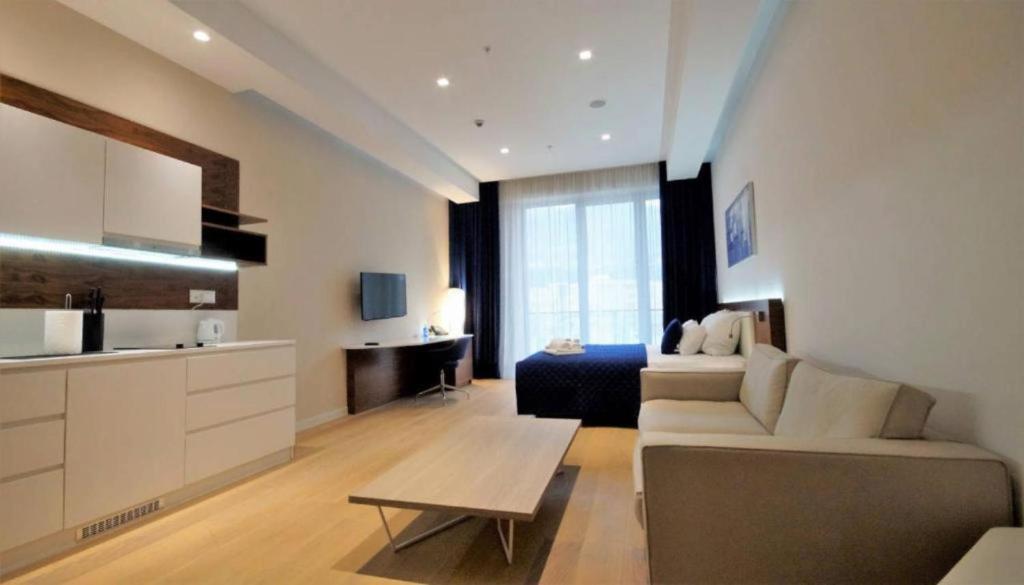 TV a/nebo společenská místnost v ubytování Condo Studio Plaza