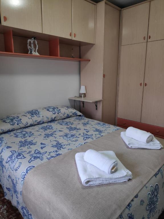 Postel nebo postele na pokoji v ubytování Alquiler Vacacional Carlos III