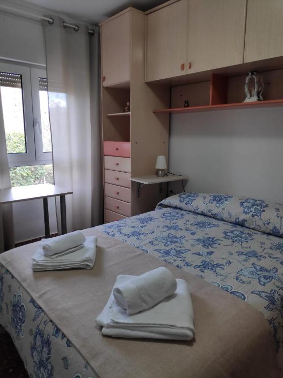 Postel nebo postele na pokoji v ubytování Alquiler Vacacional Carlos III