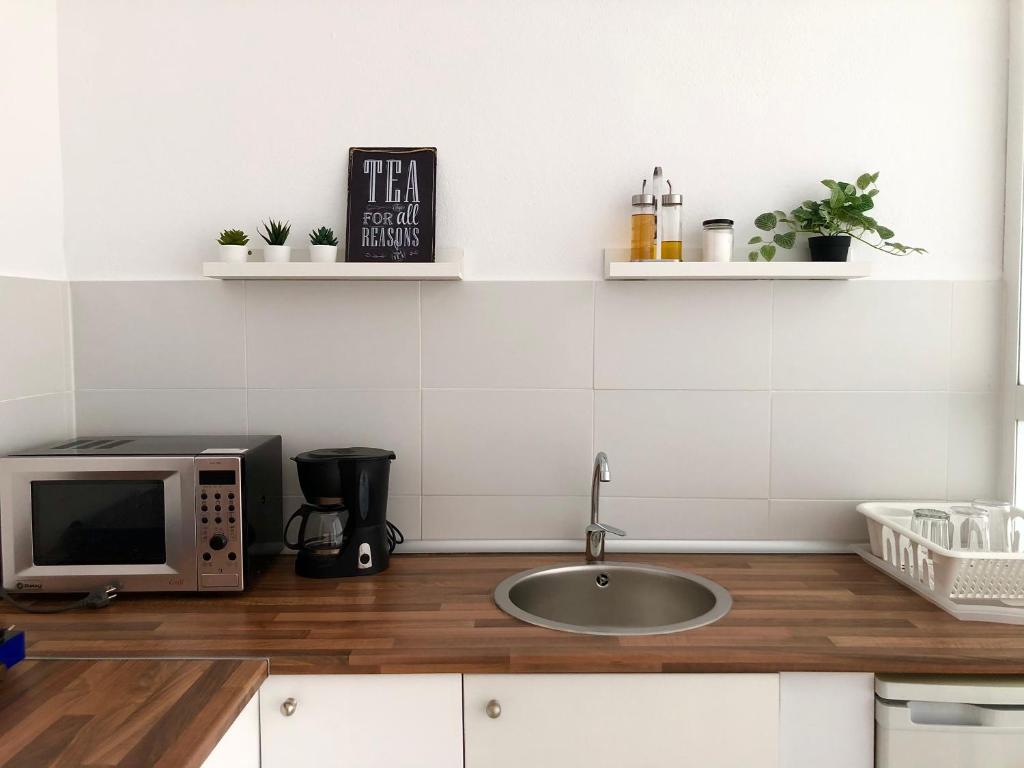 Kuchyňa alebo kuchynka v ubytovaní Loft con acceso a piscina