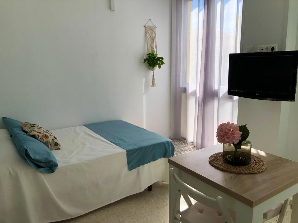 Posteľ alebo postele v izbe v ubytovaní Loft con acceso a piscina