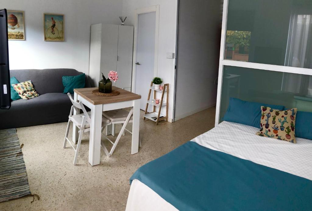 Posteľ alebo postele v izbe v ubytovaní Loft con acceso a piscina