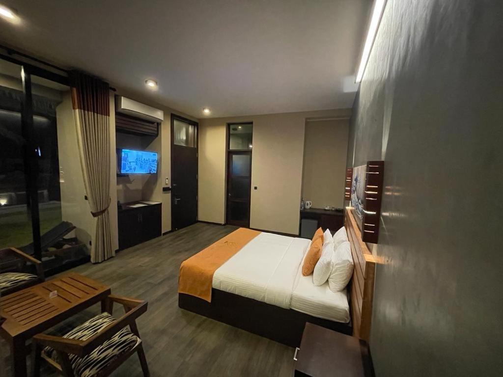 Postel nebo postele na pokoji v ubytování SOLUNA BEACH RESORT