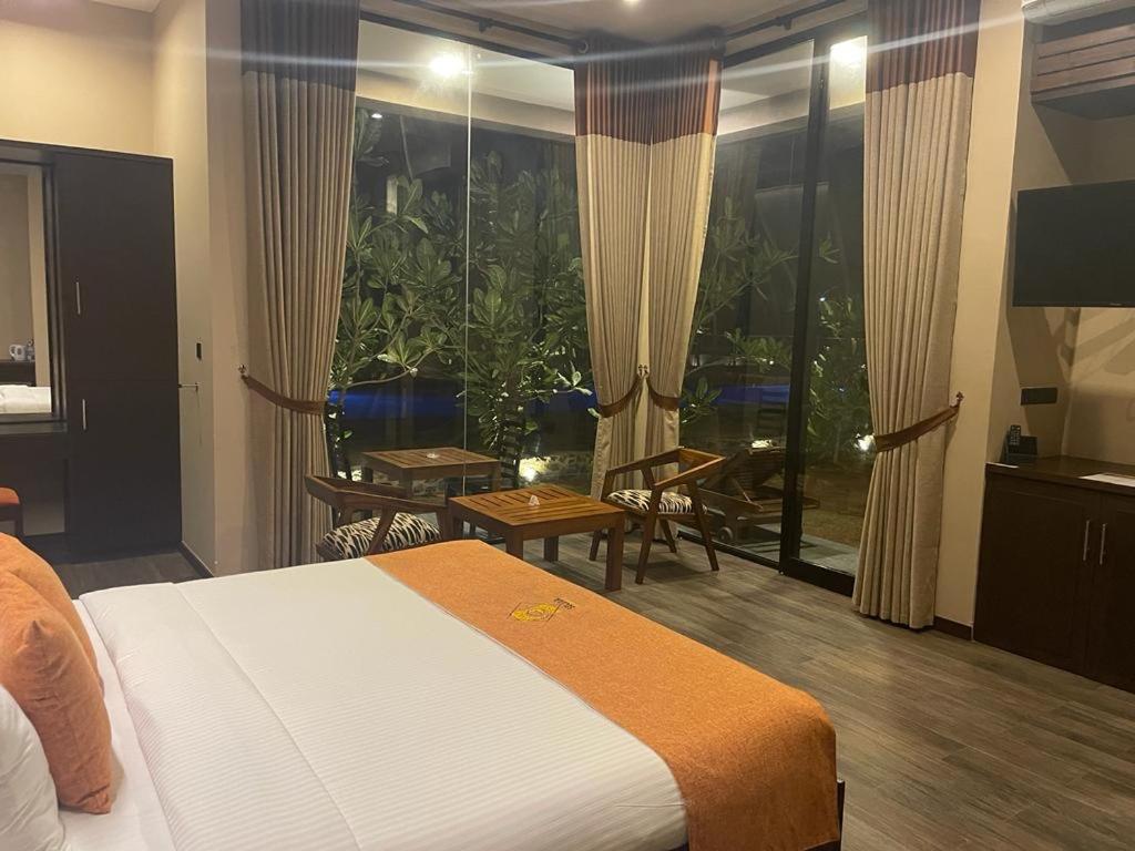 Postel nebo postele na pokoji v ubytování SOLUNA BEACH RESORT