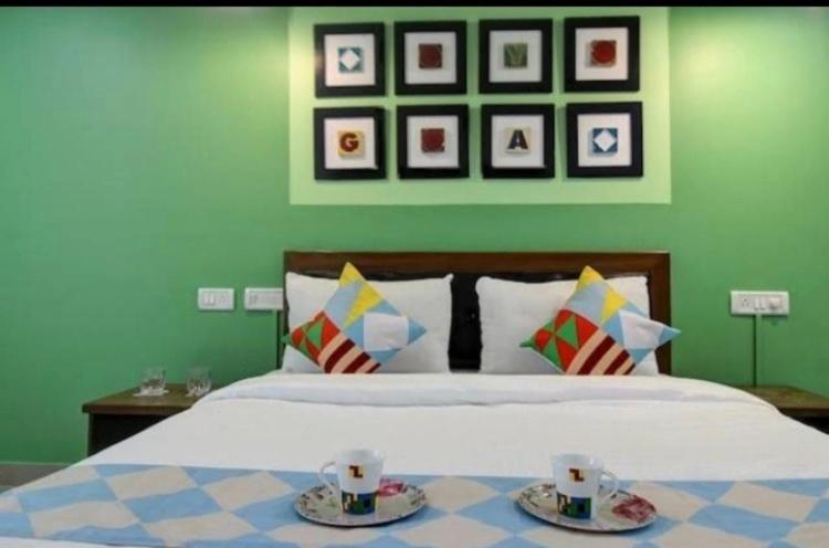 Postel nebo postele na pokoji v ubytování Hotel Sai Advika