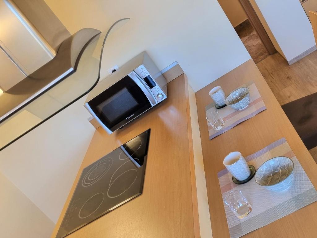 Kuchyň nebo kuchyňský kout v ubytování Apartments AD Radenci