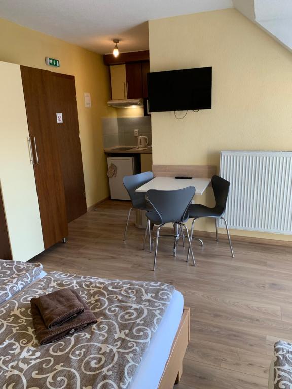 Kuchyň nebo kuchyňský kout v ubytování Apartmany Hujer
