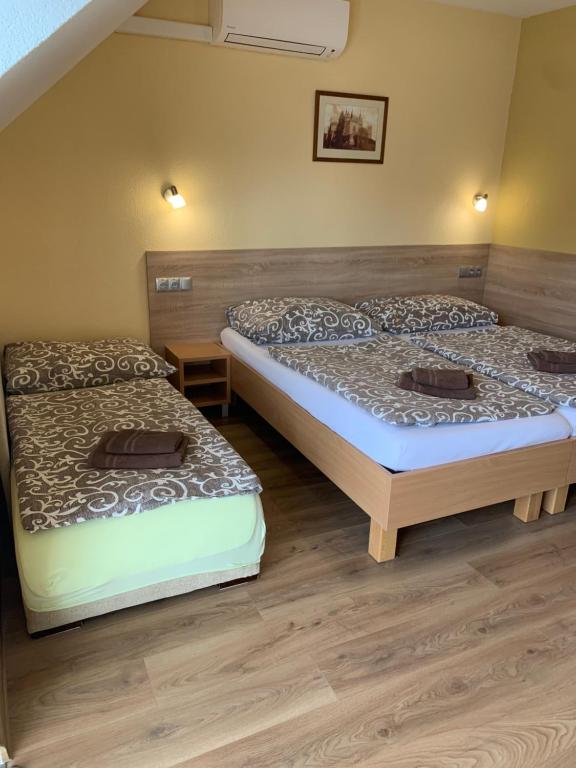 Postel nebo postele na pokoji v ubytování Apartmany Hujer