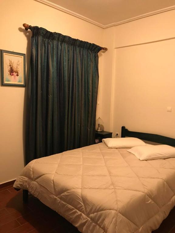 Ένα ή περισσότερα κρεβάτια σε δωμάτιο στο Star Hotel