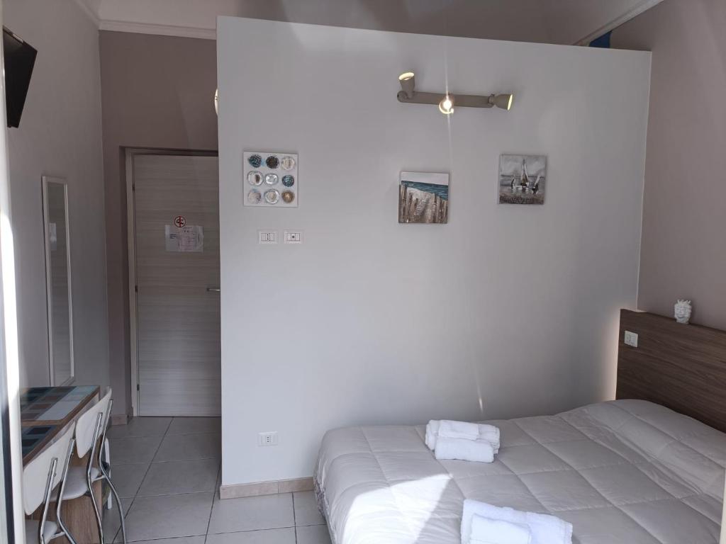 Posteľ alebo postele v izbe v ubytovaní B&B AMISTANZA