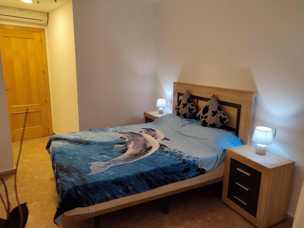 Postel nebo postele na pokoji v ubytování Albamar Apartamento 6 personas con parking cerca de la playa