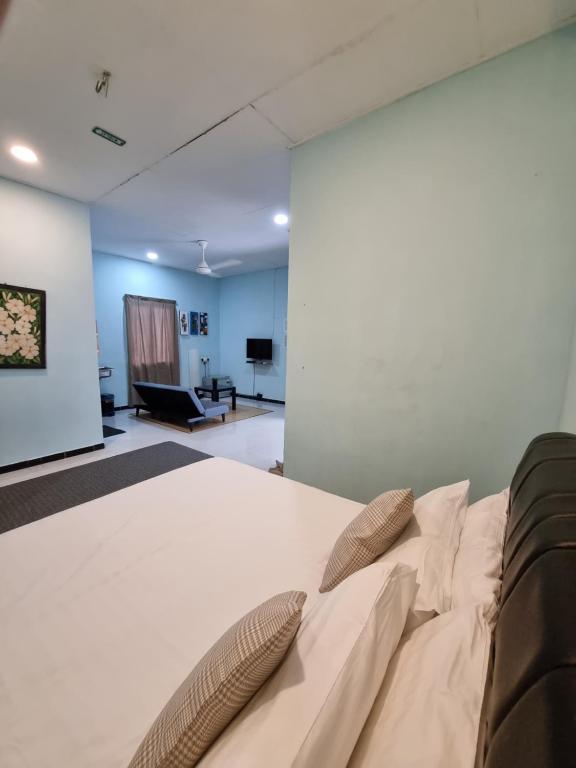 Postel nebo postele na pokoji v ubytování Seven Stones Langkawi