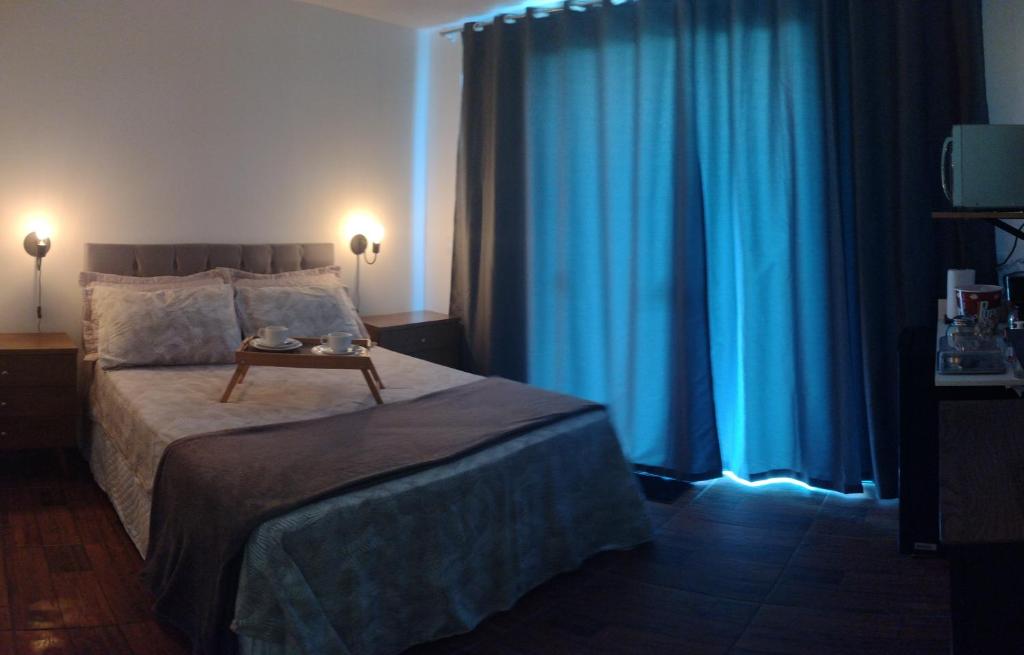 Postel nebo postele na pokoji v ubytování Suite com piscina e jacuzzi