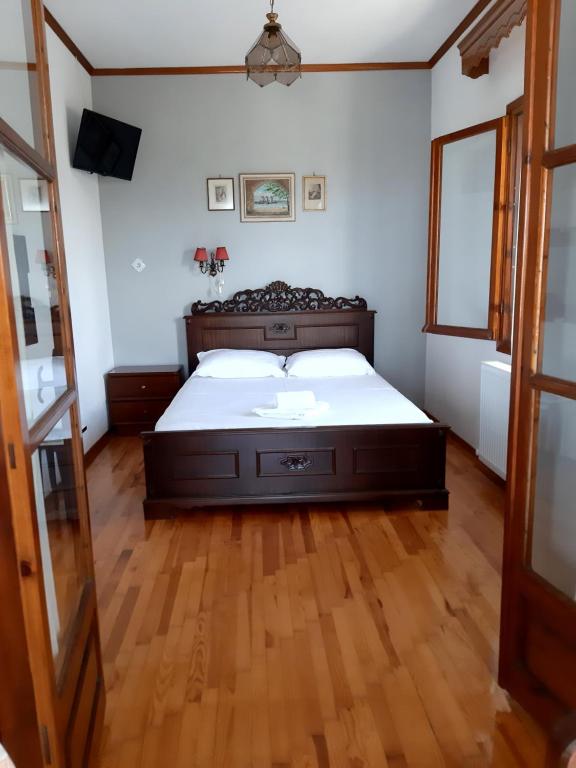 Tempat tidur dalam kamar di Οδυσσέας
