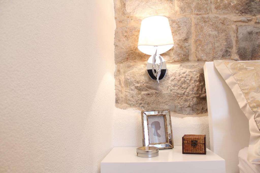 Postel nebo postele na pokoji v ubytování Summer Dream Studio