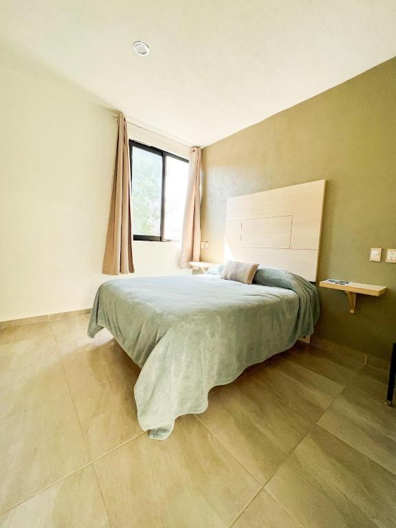 Postel nebo postele na pokoji v ubytování Hotel Hai Do