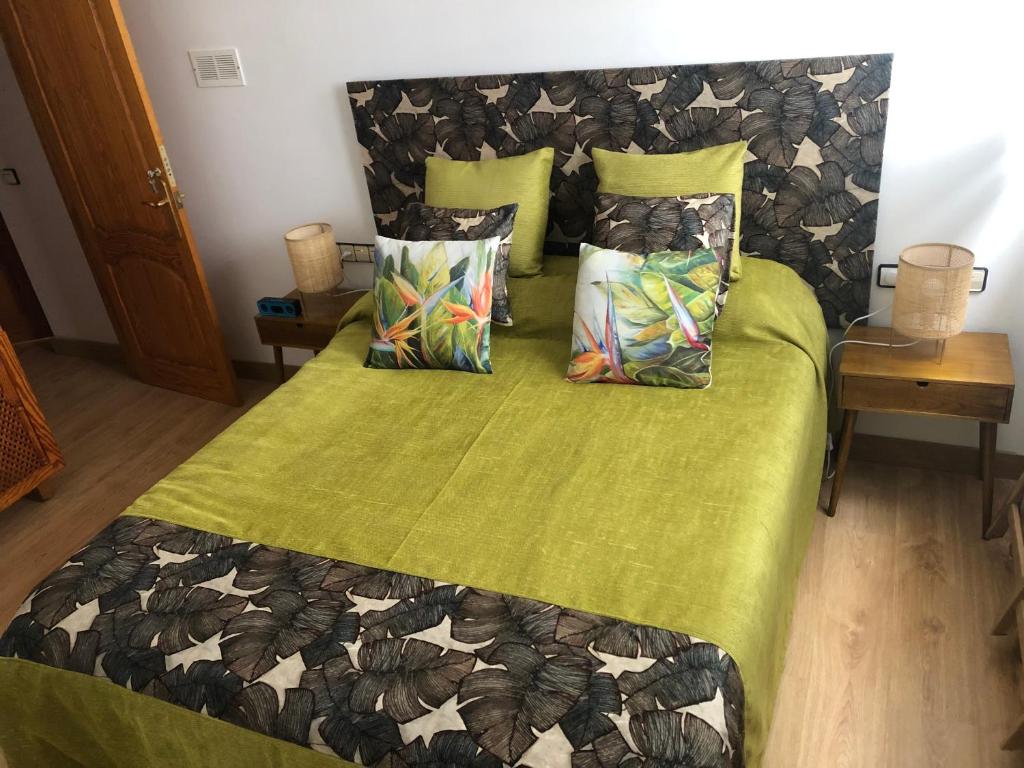 Ein Bett oder Betten in einem Zimmer der Unterkunft La Flor del Paraíso