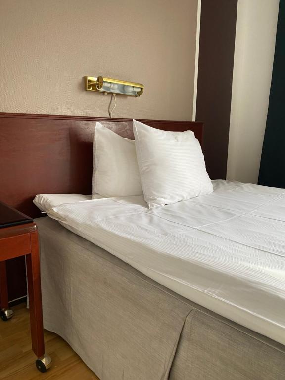Postel nebo postele na pokoji v ubytování Place Lund