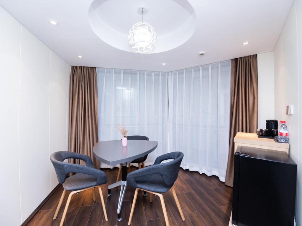 Posezení v ubytování Country Inn&Suites by Radisson, Shanghai PVG