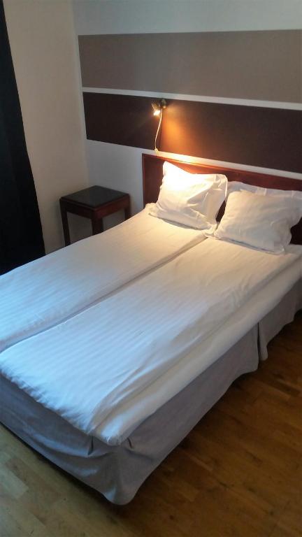 Postel nebo postele na pokoji v ubytování Place Lund