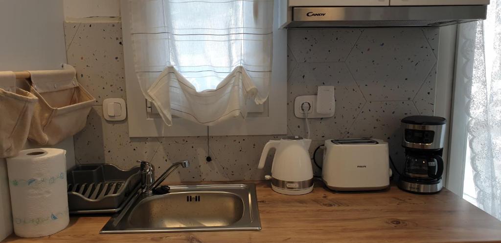 Kuchyň nebo kuchyňský kout v ubytování La Playa Studio Mykonos