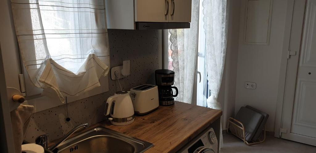 Kuchyň nebo kuchyňský kout v ubytování La Playa Studio Mykonos