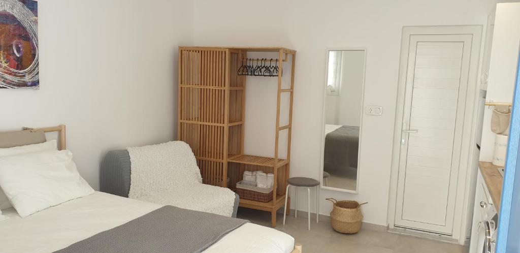 Postel nebo postele na pokoji v ubytování La Playa Studio Mykonos