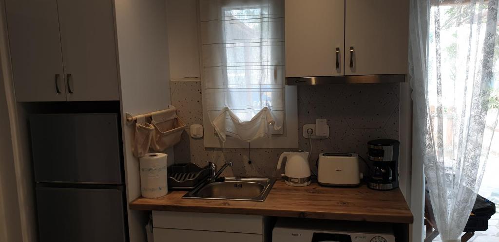 Kuchyň nebo kuchyňský kout v ubytování La Playa Studio Mykonos