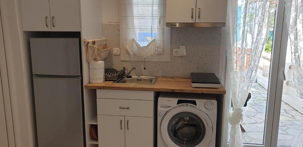 Kuchyň nebo kuchyňský kout v ubytování La Playa Studio Mykonos