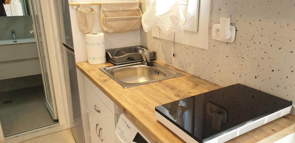 Kuchyň nebo kuchyňský kout v ubytování La Playa Studio Mykonos