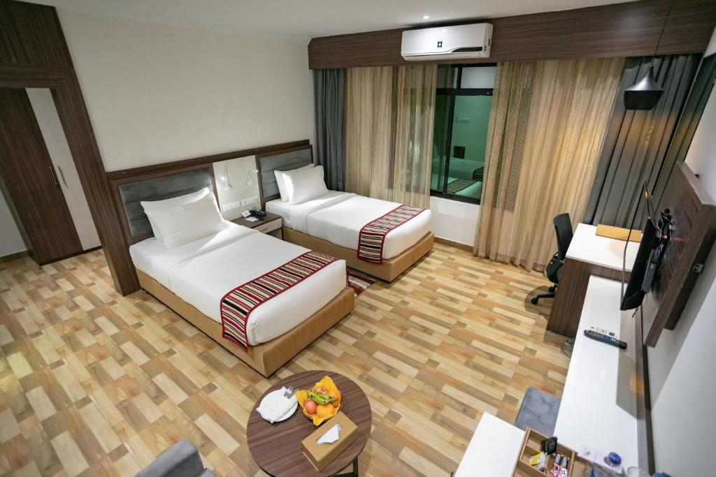 Postel nebo postele na pokoji v ubytování Hotel Starlight
