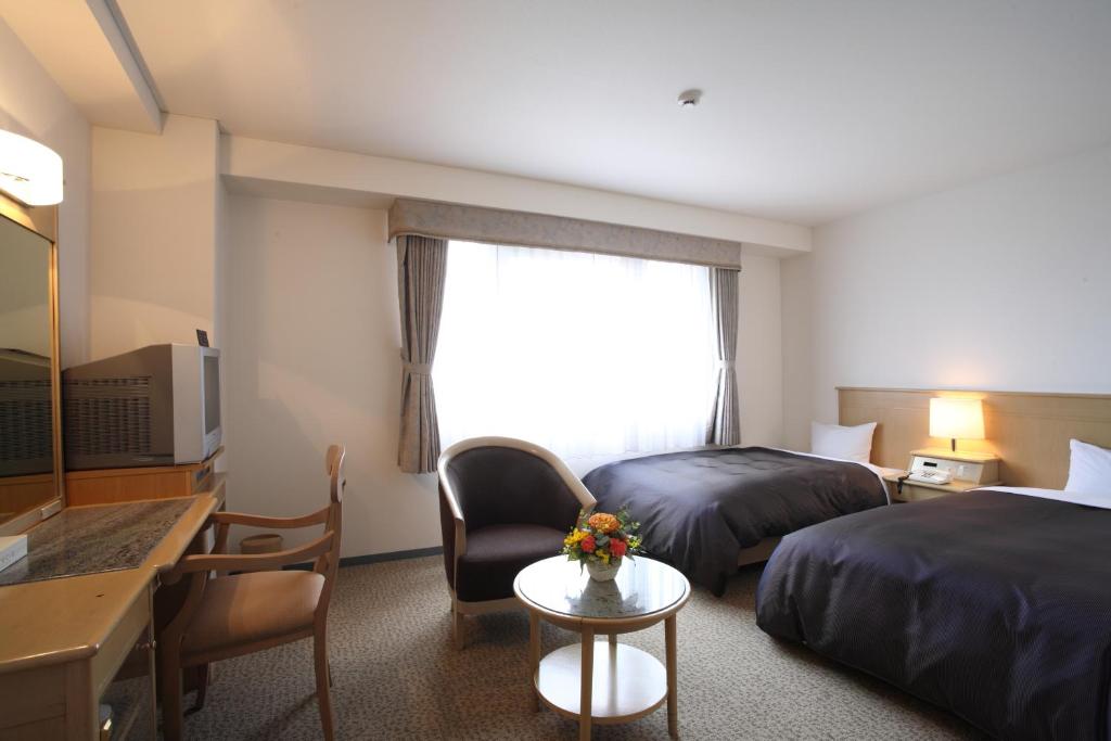 Postel nebo postele na pokoji v ubytování Hotel Bientos