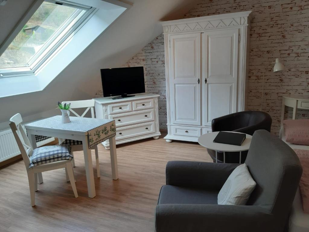 TV a/nebo společenská místnost v ubytování Landhaus Julia