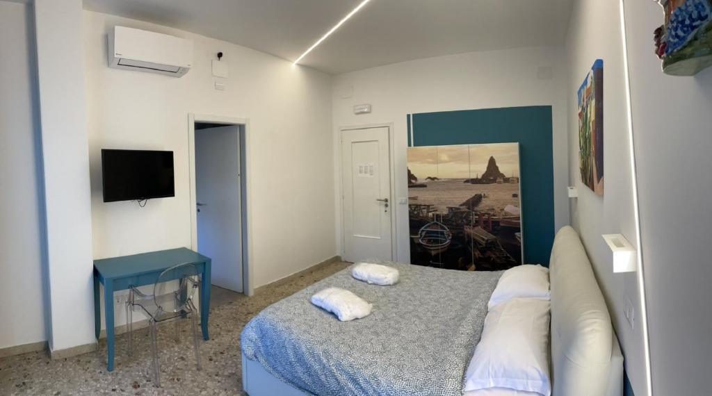 Posteľ alebo postele v izbe v ubytovaní Catania Apartment Borgo Suite Autonomous