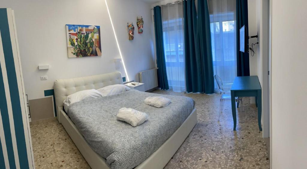 Posteľ alebo postele v izbe v ubytovaní Catania Apartment Borgo Suite Autonomous