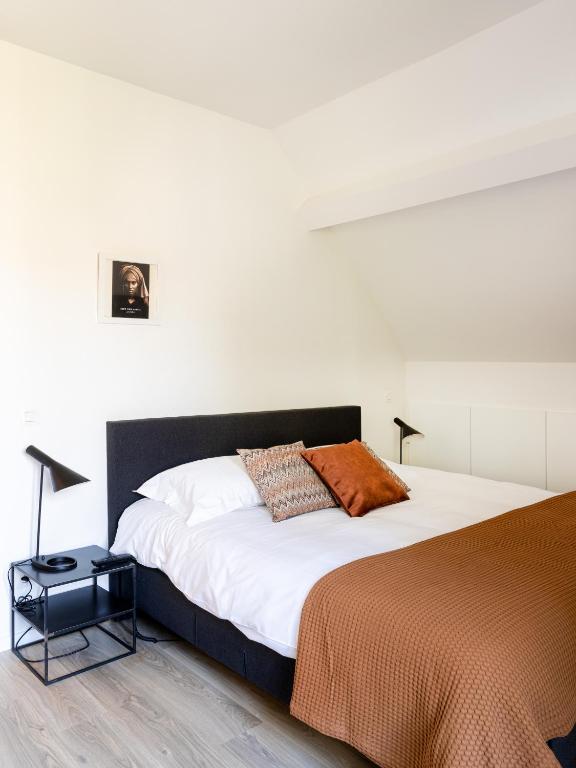 Postel nebo postele na pokoji v ubytování Maison Josephine