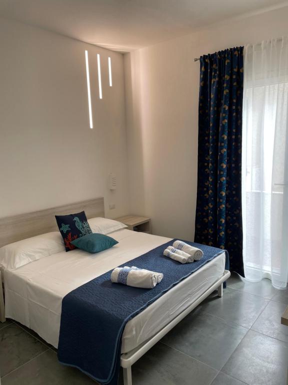 Postel nebo postele na pokoji v ubytování Alghero VitAlba