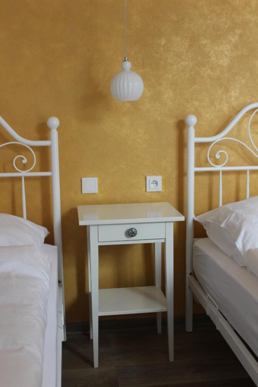 Postel nebo postele na pokoji v ubytování Modrá Hortenzie