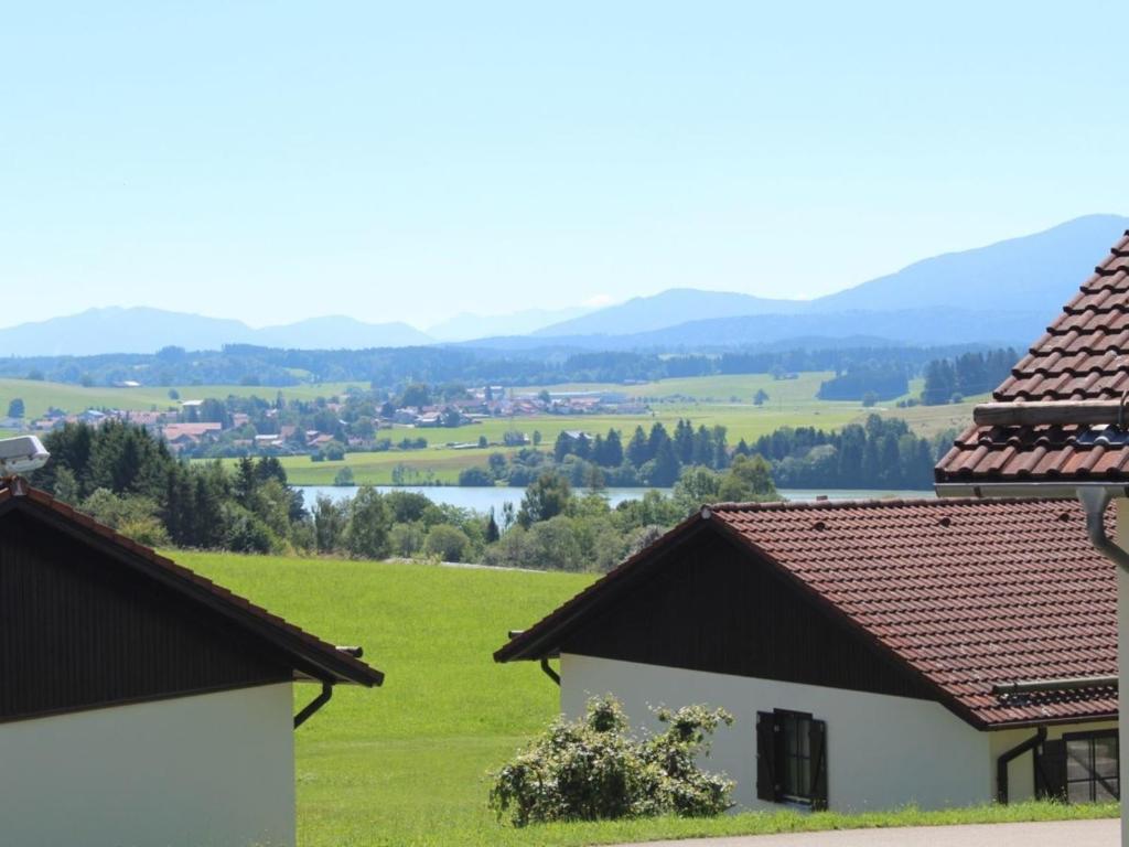 a view of the valley from a house at Ferienhaus Nr 93, Kategorie Komfort Plus, Feriendorf Hochbergle, Allgäu in Karlsebene