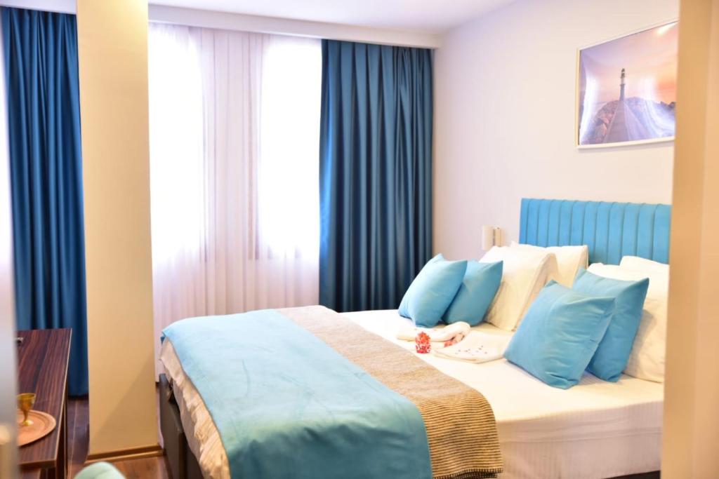 A bed or beds in a room at Nos Istanbul