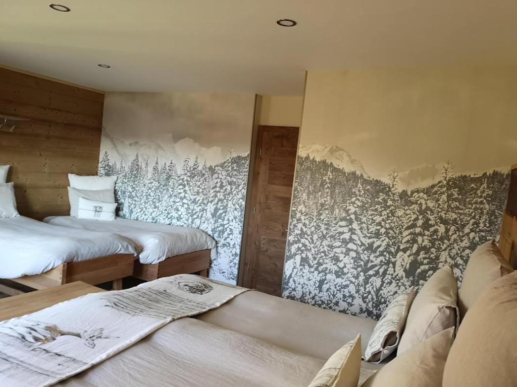 Postel nebo postele na pokoji v ubytování Maison Le ROZET