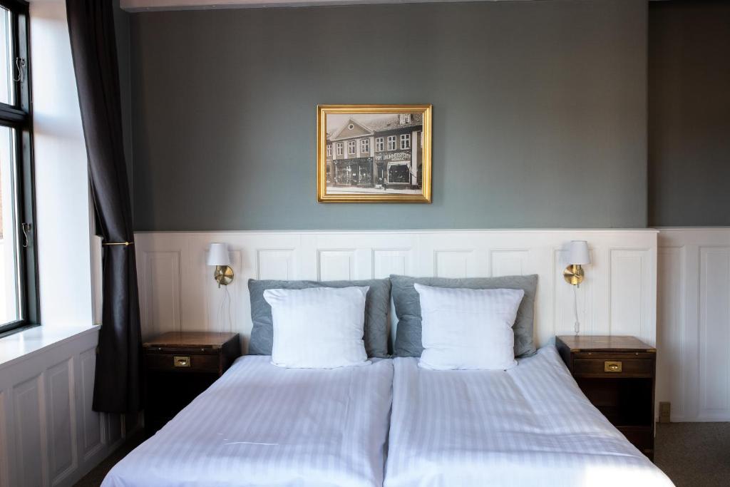 Postel nebo postele na pokoji v ubytování Hotel Hamlet