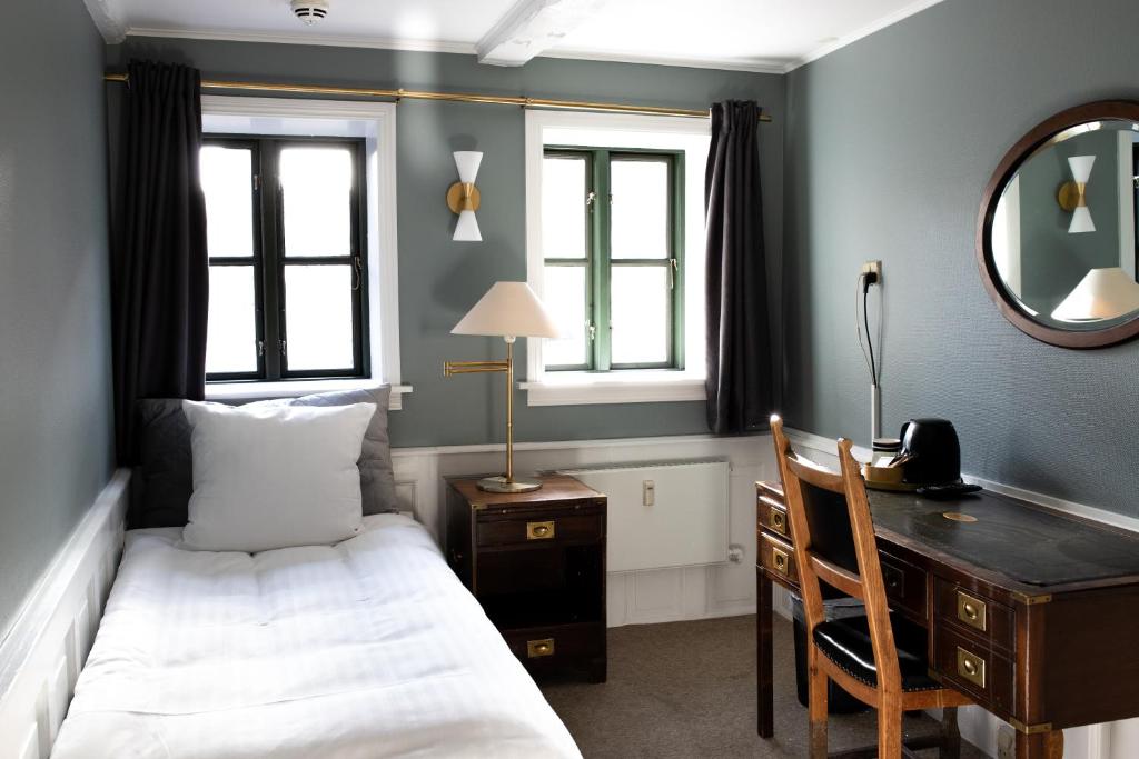 Postel nebo postele na pokoji v ubytování Hotel Hamlet