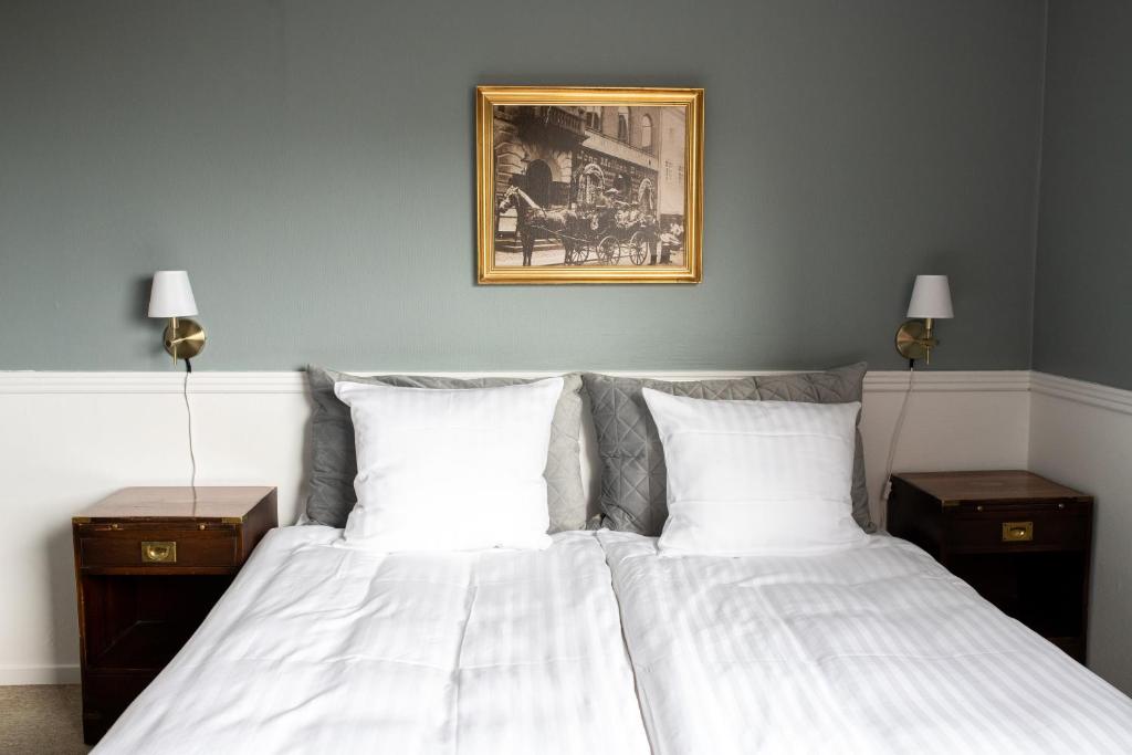 Postel nebo postele na pokoji v ubytování Hotel Hamlet